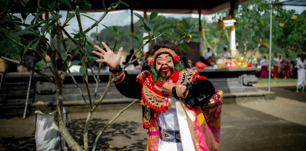 Colorful performance of traditional Balinese Barong dance in Denpasar, showcasing rich cultural attire and expressive movement.
