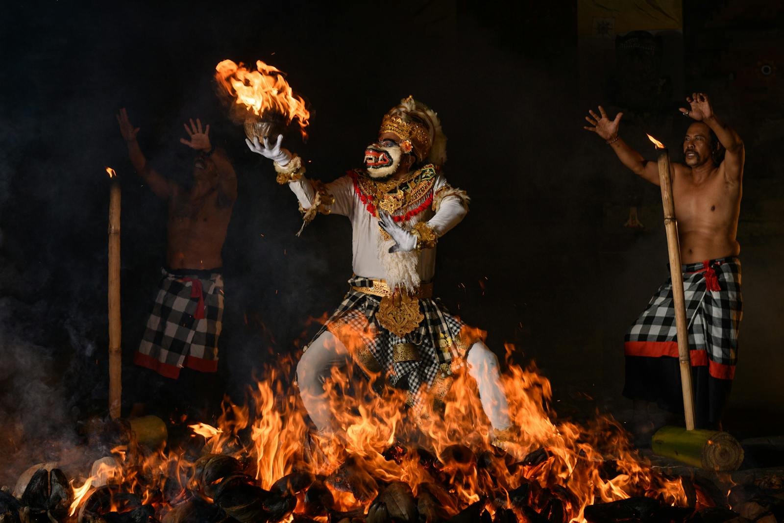 Dynamic Kecak dance with fire, showcasing Balinese cultural heritage.