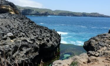 a view of the ocean from a cliff