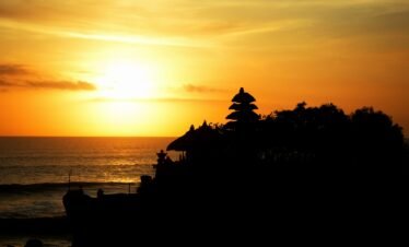 a sunset over a beach