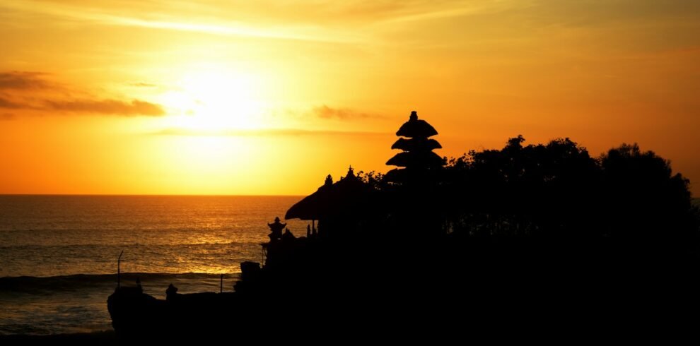 a sunset over a beach