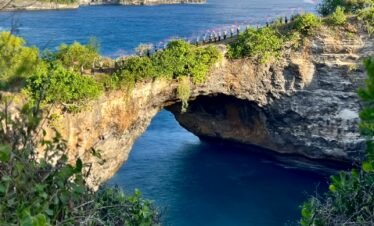 a view of the ocean from a cliff